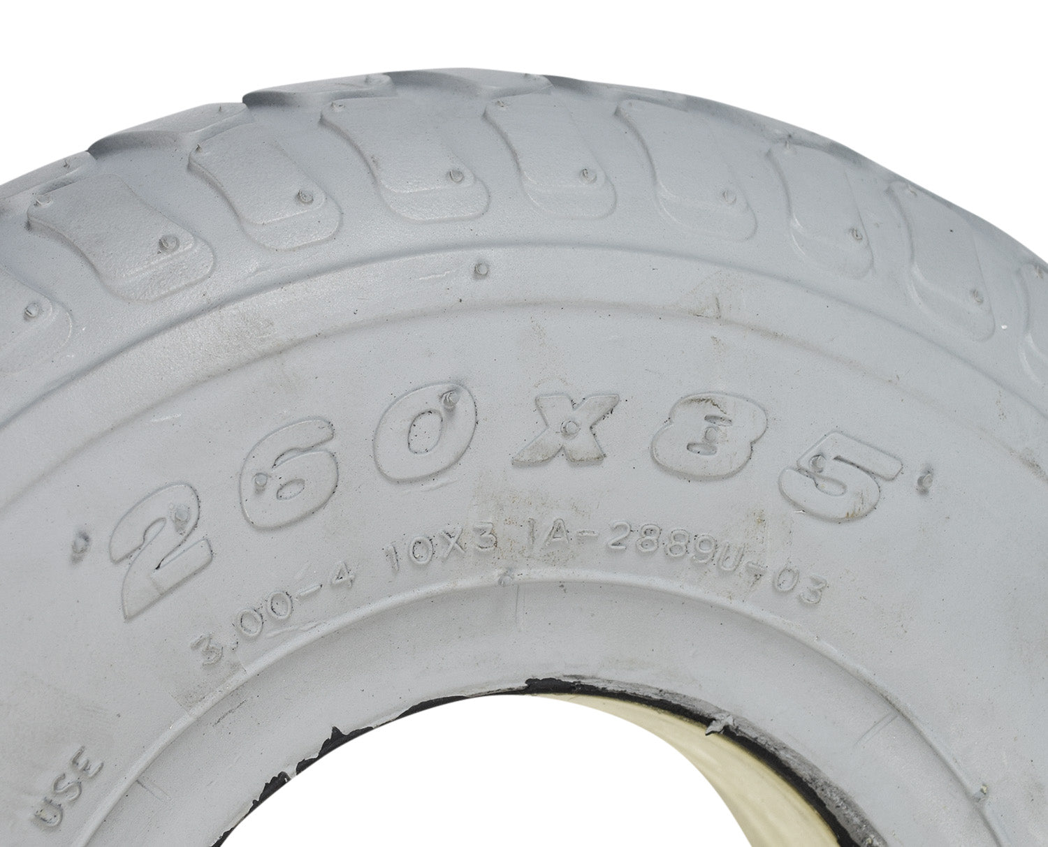 Close-up of a 3.00-4 (10x3, 260X85) foam-filled tire with IA-2889U tread pattern for Shoprider Scooters, showing intricate tread details and smooth surface.