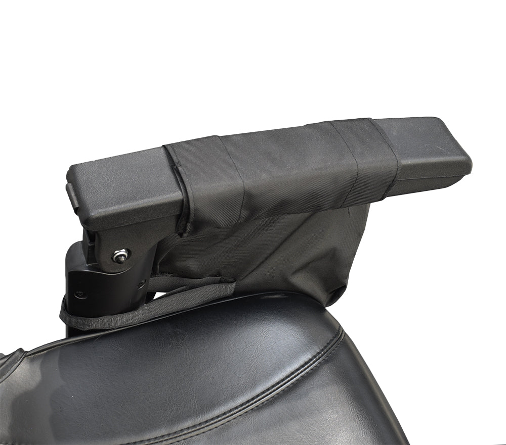 Saddle Bag for Mobility Scooters, Power Chairs, & Wheelchairs: Close-up of a black nylon armrest-mounted saddle bag with Velcro and zipper pouches for personal items, featuring reflective safety tape for visibility.