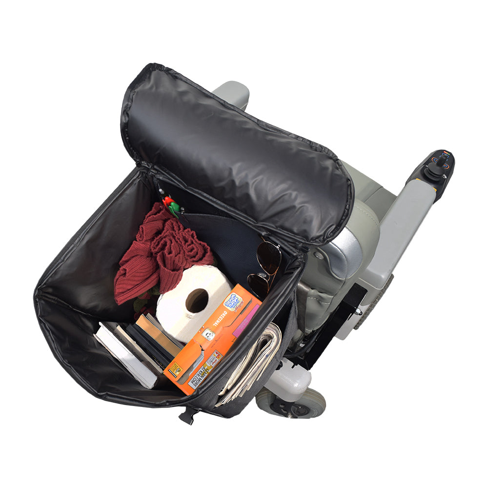 Extra Large Insulated Seat Back Bag (Backpack) for Mobility Scooters & Power Chairs, filled with items including a visible roll of toilet paper, showcasing its ample storage capacity and durable design.