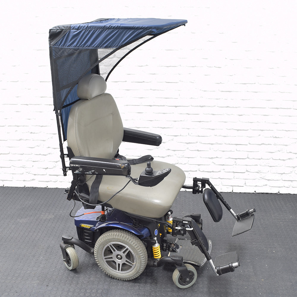 Weatherbreaker Canopy for Scooters & Power Chairs: A wheelchair with a protective canopy, foot pedals, and sturdy tires, designed to shield users from sun and rain, enhancing outdoor mobility.