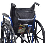 Seat Back Bag (Backpack) for Mobility Scooters & Power Chairs, attached to a wheelchair, showing a zippered compartment with books and sunglasses, and additional storage pockets visible.