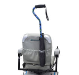 Universal Cane Holder & Saddle Bag Combination for Mobility Scooters, Power Chairs, & Wheelchairs showcasing a grey nylon bag with pockets and a black umbrella, attached to a wheelchair handle.