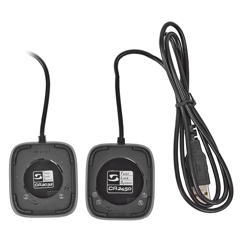 Docking Station for the ROX 5.0 and ROX 6.0 Wireless Bike Computers, featuring two black electronic devices connected by a cable, designed for efficient data transfer and charging.