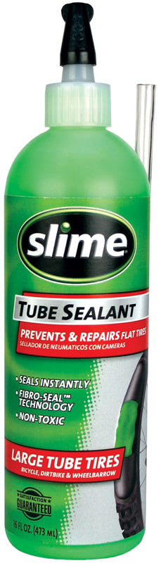 Slime Tube Sealant - 16 oz Bottle features a green and white label with text and logo on a cylindrical container. Designed to prevent and repair flats, it installs through the valve stem.