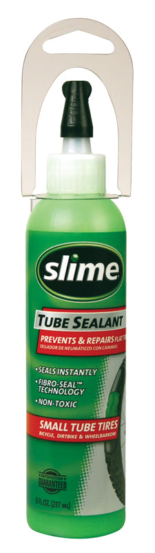 Slime Tube Sealant - 8 oz Bottle with a green label featuring white text, designed for puncture repair up to 1/8 inch, non-toxic, and used by applying through the valve stem.