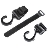 Two swivel hooks with a hook and loop mounting strap laid out between them