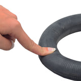 8-1/2x2 (225x48) Scooter Inner Tube with Angled Valve Stem being pointed at by a finger, highlighting the durable rubber material and precise size for compatibility with various scooters.