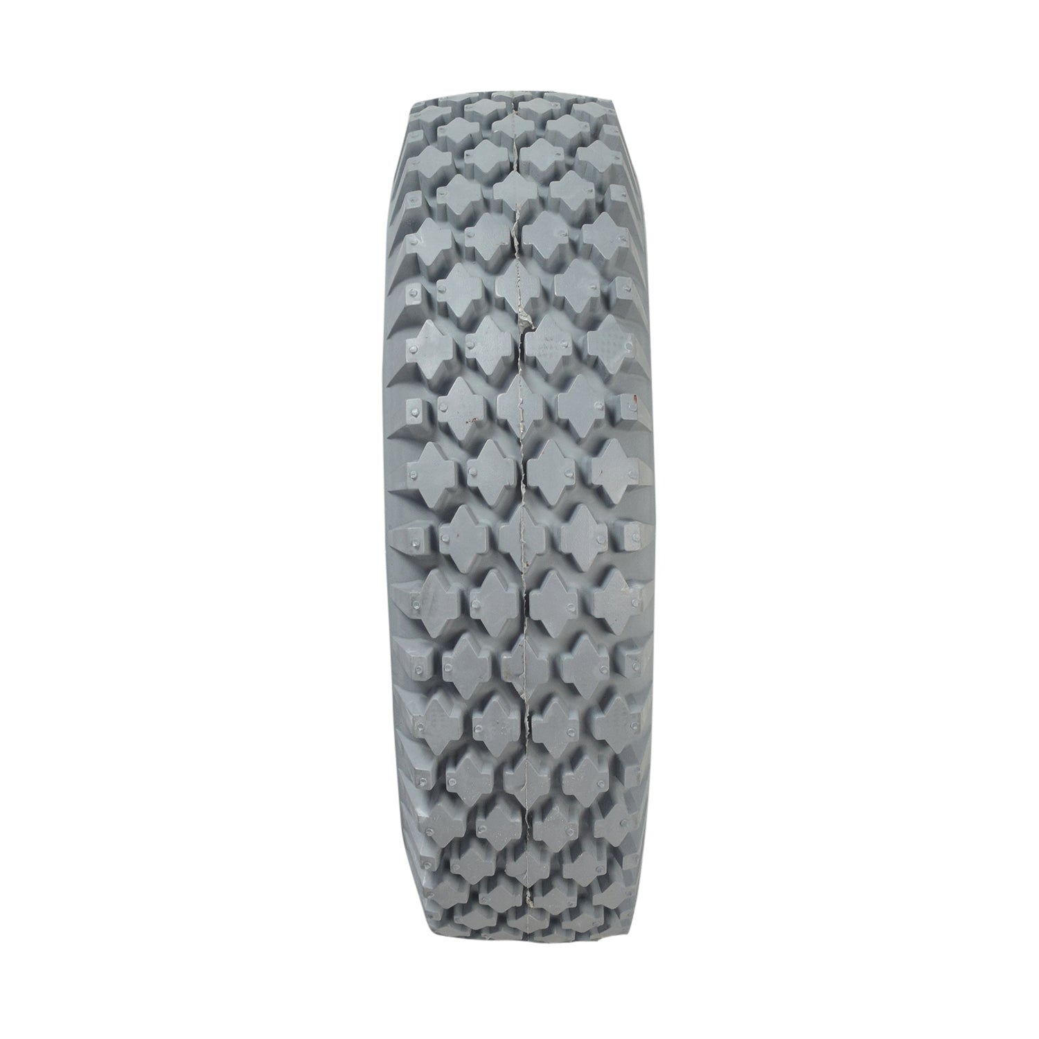 4.10/3.50-6 Pneumatic Mobility Tire with C156G Nimble Knobby Tread, close-up of its non-marking gray rubber and intricate tread pattern, designed for smoother rides on mobility scooters and power chairs.