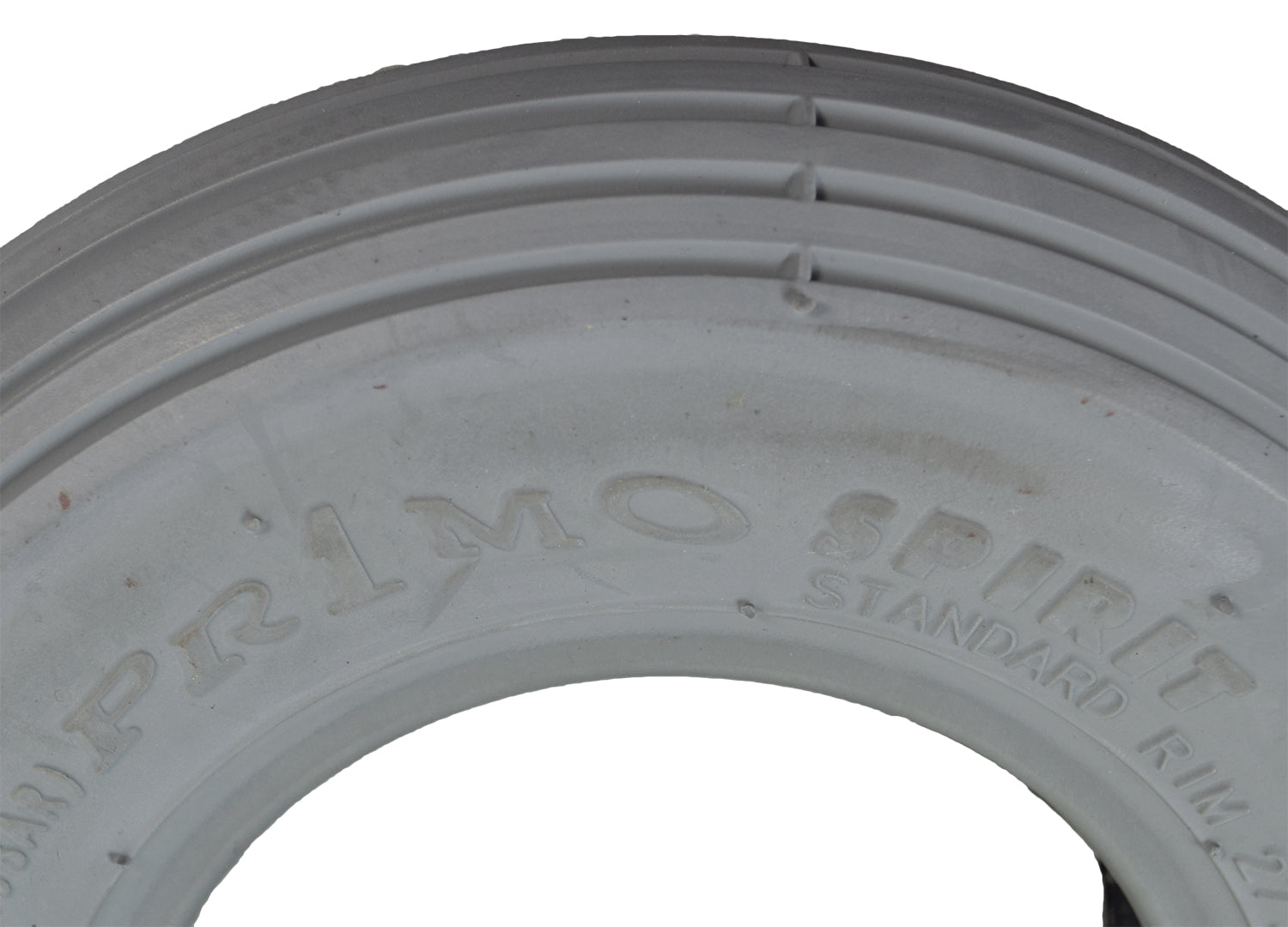 Close-up of an 8x2 (200x50) pneumatic mobility tire with C179G Spirit ribbed tread pattern, showing detailed grooves and texture, designed for mobility scooters and power chairs.