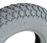 Close-up of the 8x2 (200x50) Pneumatic Mobility Tire with C968 Diamond Tread, highlighting the aggressive tread pattern and rubber texture, ideal for mobility scooters and robotics competition use.