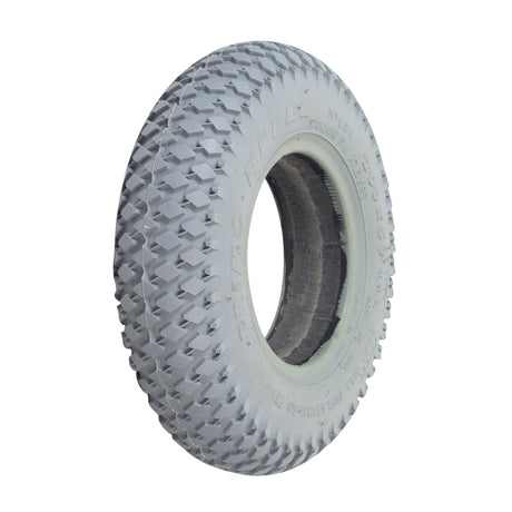 Close-up of an 8x2 (200x50) foam-filled mobility tire with C968G Rebel knobby tread pattern, designed to never go flat.