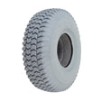 Close-up of the 3.00-4 (10x3, 260x85) Foam-Filled Gray Tire for ActiveCare Pilot (2310/2410) Scooters & ActiveCare Power Chairs, showcasing its non-marking gray rubber tread and solid construction.