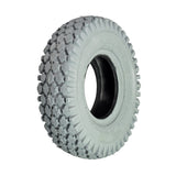 Close-up of the 4.10x3.50-5 Pneumatic Mobility Tire with Nimble Knobby Tread, showcasing detailed tread pattern and high-quality non-marking gray rubber, ideal for smooth rides indoors and outdoors.