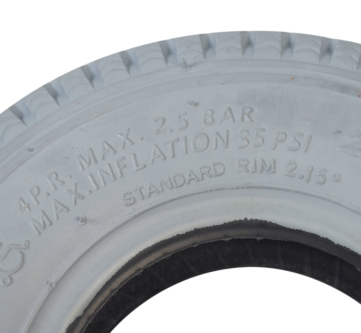 Close-up of the 2.80/2.50-4 (9x3) Pneumatic Mobility Tire with C178G Power Edge sawtooth tread, showcasing detailed text and markings on the tire's surface.