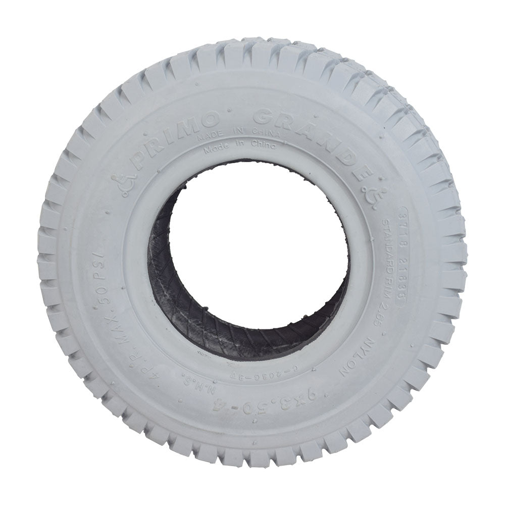 9x3.50-4 Pneumatic Mobility Tire with C203 Grande Knobby Tread, designed for power wheelchairs and scooters, showcasing a non-marking gray rubber tire with a central hole and knobby tread pattern.