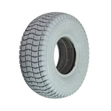 9x3.50-4 Foam Filled Mobility Tire with C203 Grande Knobby Tread: close-up of a white tire with a black center, designed for mobility scooters and power chairs, ensuring a flat-free experience.