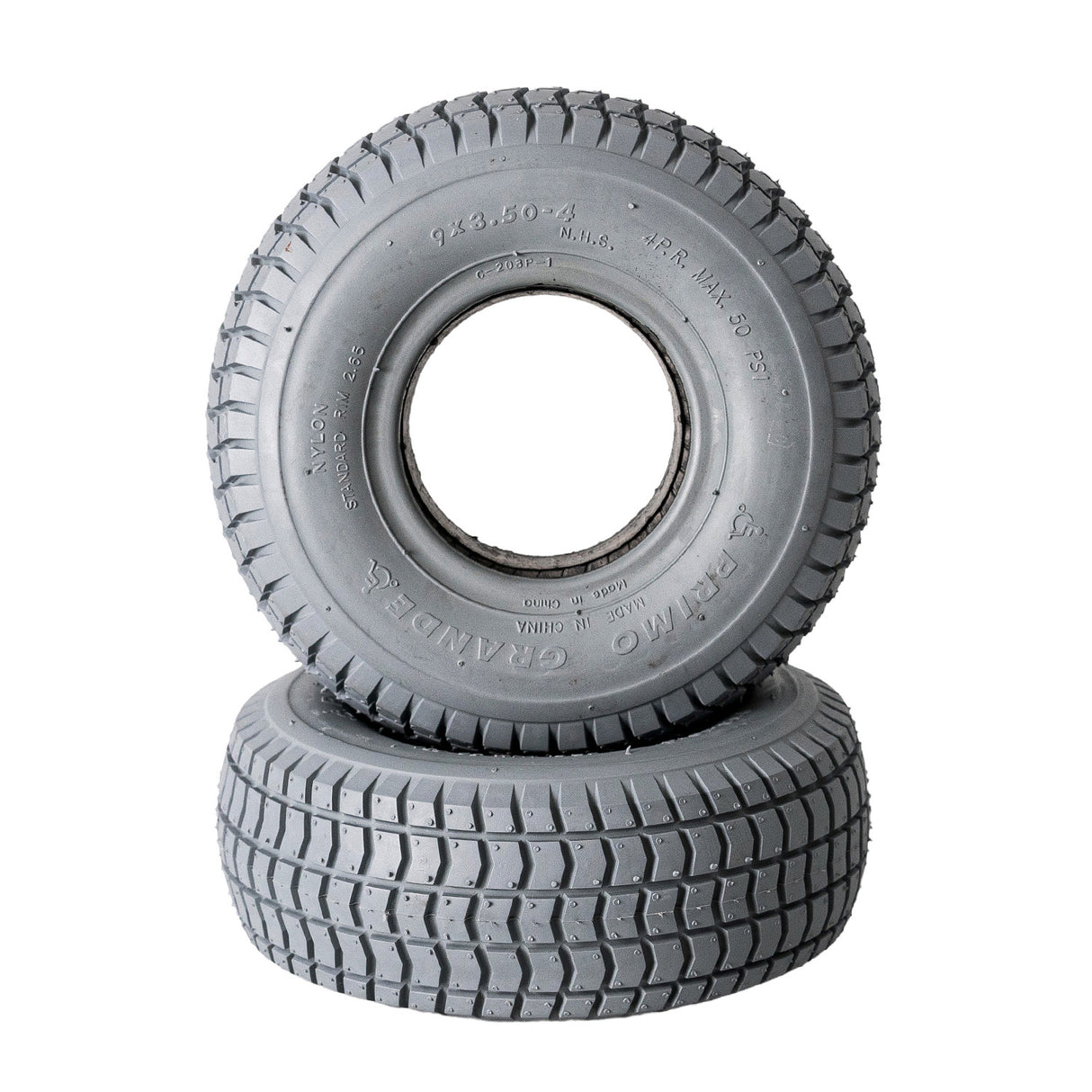 Stack of 9x3.50-4 Foam Filled Mobility Tires with C203 Grande Knobby Tread, featuring a hole in the center, perfect for mobility scooters and power chairs.