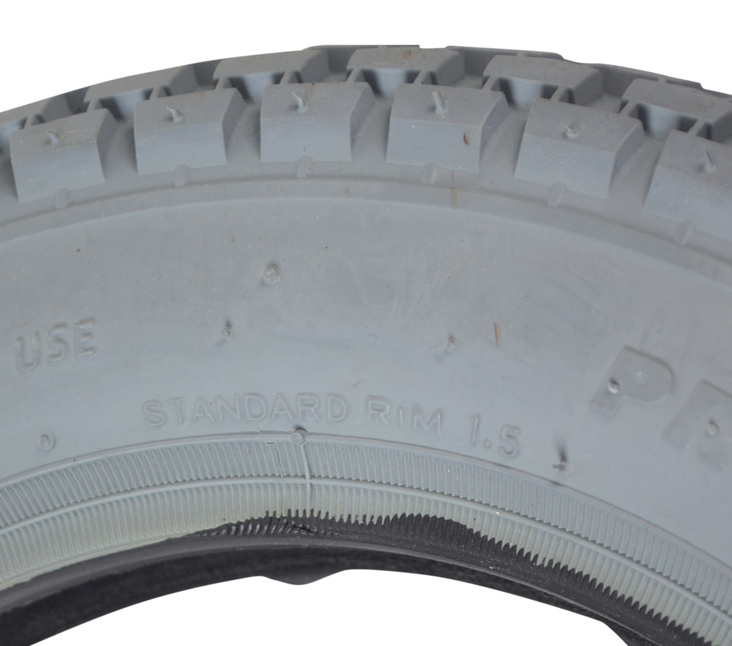 Close-up of the 2.50-8 Pneumatic Mobility Tire with C177G Power Plant Tread, showcasing its detailed knobby tread pattern, ideal for a smoother ride in mobility applications.