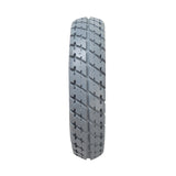 Close-up of 9x3 (2.80/2.50-4) Pneumatic Mobility Tire with Durotrap C9210 Tread, showcasing its smooth, round profile and in-cut tread pattern for superior grip and efficient water dispersal.