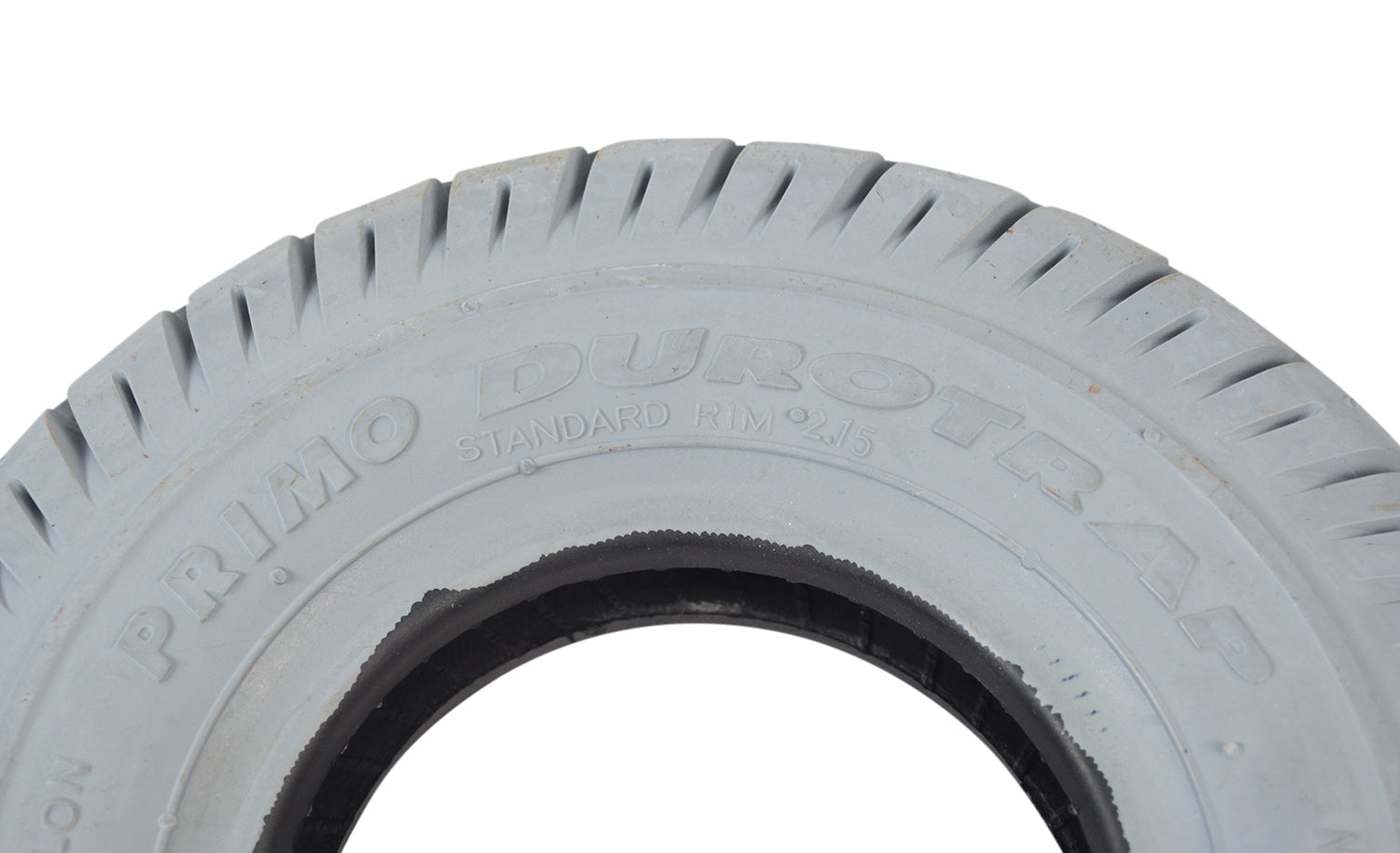 Close-up of the 9x3 (2.80/2.50-4) Pneumatic Mobility Tire with Durotrap C9210 Tread, showcasing its detailed tread pattern and smooth, rounded profile designed for efficient rolling and superior grip.