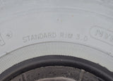 Close-up of the 4.00-5 (13x4, 330x100) Foam-Filled Mobility Tire with C154 Diamond Tread, showcasing its non-marking gray rubber surface and intricate tread pattern suitable for mobility scooters and power chairs.