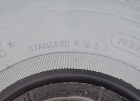 Close-up of the 4.00-5 (13x4, 330x100) Foam-Filled Mobility Tire with C154 Diamond Tread, showcasing its non-marking gray rubber surface and intricate tread pattern suitable for mobility scooters and power chairs.