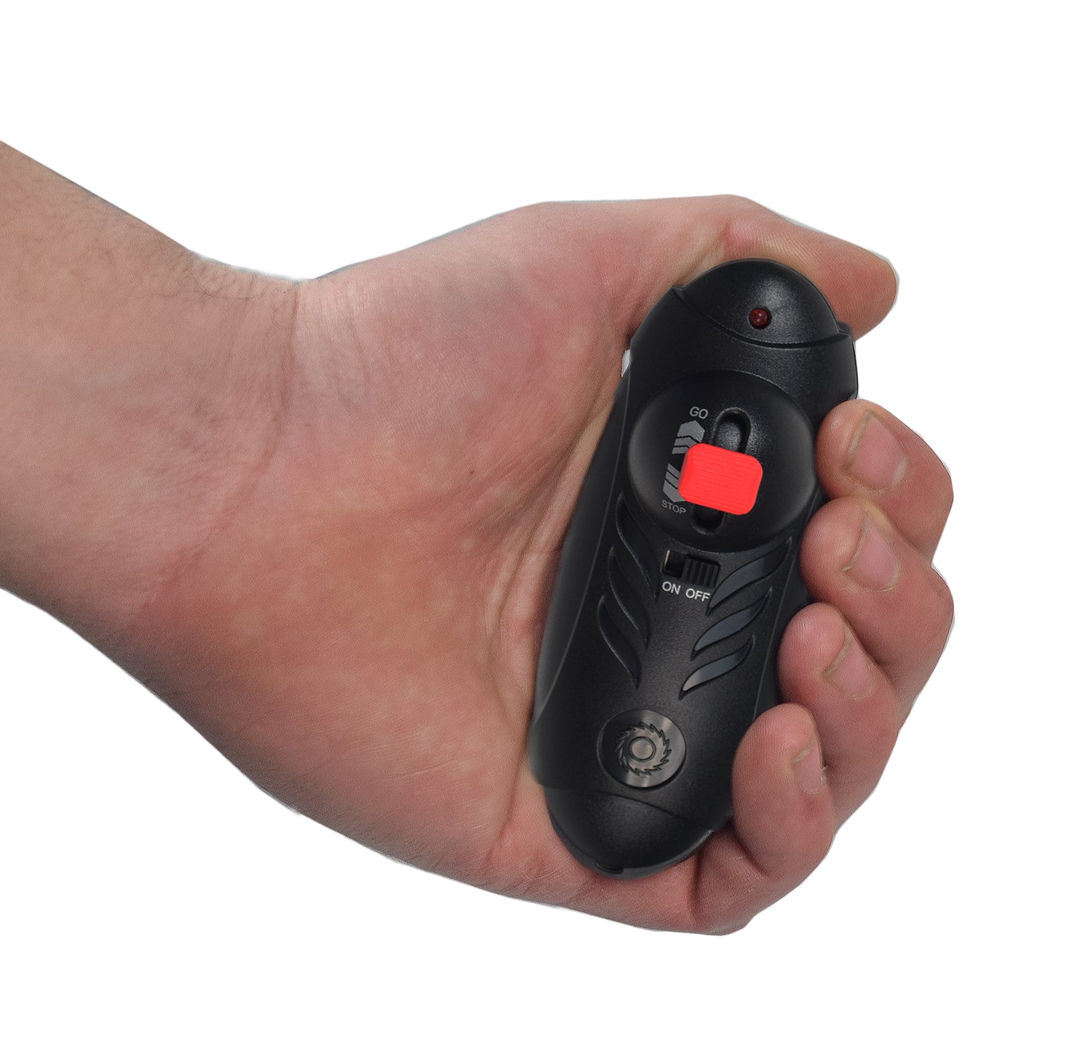 Hand holding the Hand Control for the RazorX DLX Electric Skateboard, a black wireless 2.4 GHz remote with a power button, essential for operating the skateboard.