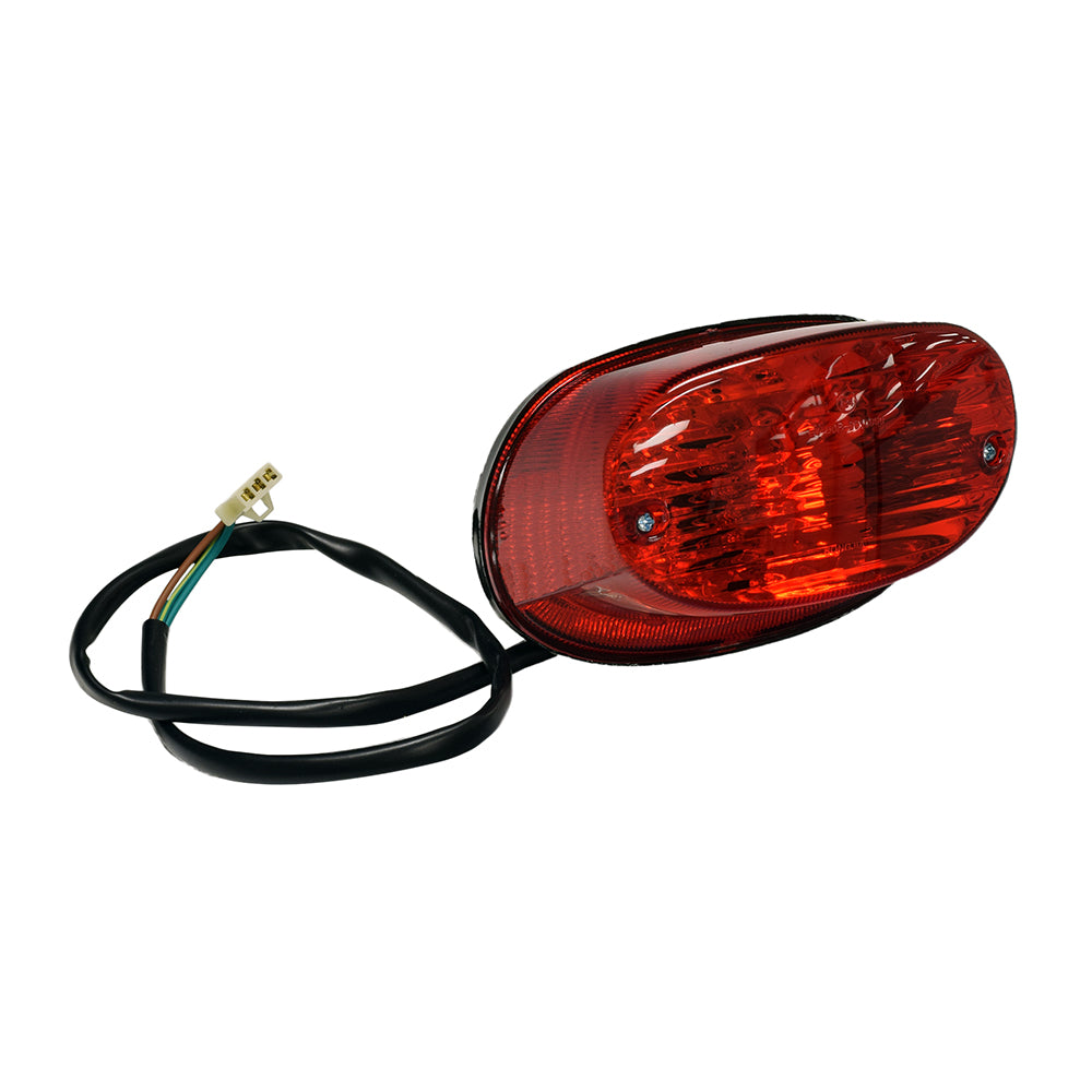 Taillight for the Baja WD90U 90cc ATV (VIN Prefix LE8S) featuring a red lens, attached black wire, and white connector, shown in close-up detail, essential for safe ATV operation.