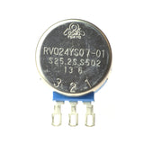 Throttle Potentiometer Assembly for the Drive Gladiator (G694) Mobility Scooter, featuring a round metal object with numbers, seen in a close-up view highlighting its intricate components and design.