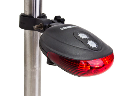 TL-L300Z Lazer Guide Taillight mounted on a bike, shown close-up on a pole, highlighting its red light for enhanced nighttime visibility.