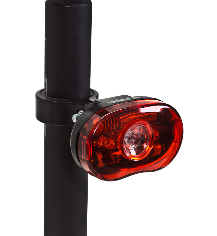 Close-up of the TL-L330 LED Taillight mounted on a pole, showcasing its bright red light, designed for enhanced safety on bicycles and scooters during nighttime riding.