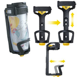 Topeak Modula Java Bottle Cage: A black, adjustable bottle holder with yellow arrows, designed to securely hold coffee tumblers or mugs of varying sizes, featuring an adjustable rubber strap for stability during cycling.