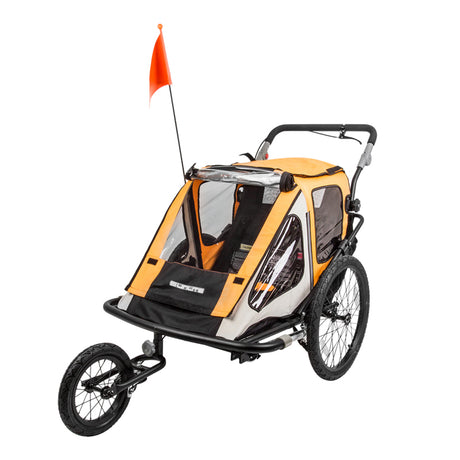 Trailer Tot Convertible Bike Trailer with flag, black and yellow, featuring quick-release wheels and a protective screened cover. Designed for two kids, it functions as both a bike trailer and a jogger stroller.