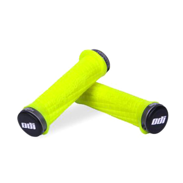 Troy Lee ODI Lock-on Handlebar Grips for Bikes & Scooters, featuring grooved channels and a custom flanged design, displayed in a close-up view highlighting the grip texture and logo details.