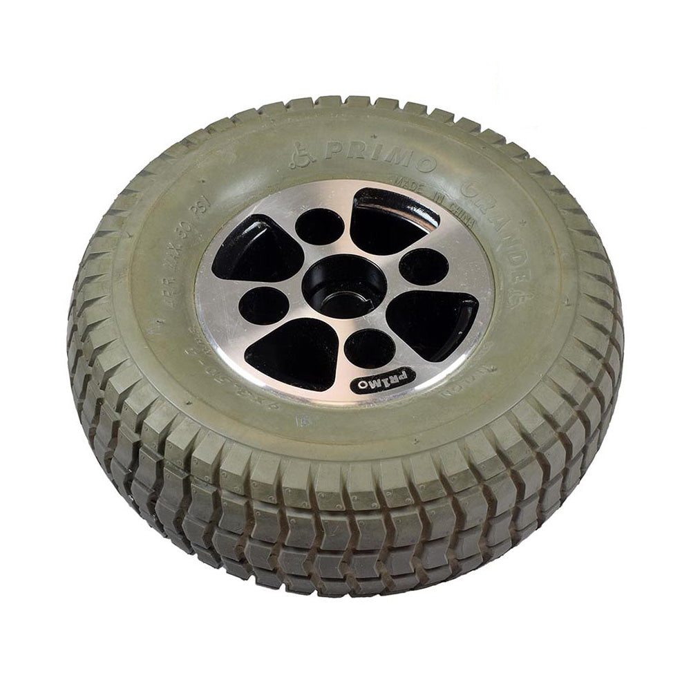 9x3.50-4 Foam Filled Drive Wheel Assembly for the Hoveround® MPV5® (Used) featuring a silver rim and a deep-tread tire, pre-assembled, designed specifically for the MPV5® power chair.