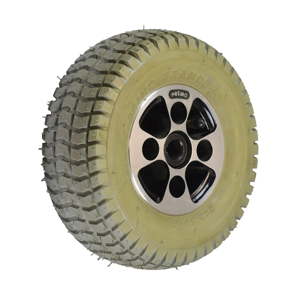 9x3.50-4 Pneumatic Drive Wheel Assembly for the Hoveround® MPV4® (Used) featuring a black rim, knobby tread tire, and complete with a rim, tube, and tire.