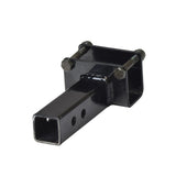 Accessory Mounting Bracket for Jazzy and Jet Power Chairs with Limited Recline Seating (Used): Close-up of a black metal object with screws, suitable for attaching custom accessories or rear-mounted baskets.