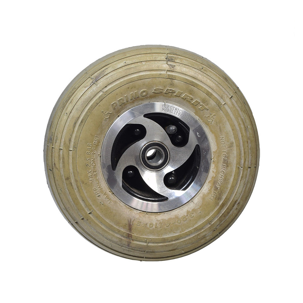 3.00-4 (10x3, 260x85) Pneumatic Front Wheel Assembly for the Rascal 600F (Used), featuring a metal rim and ribbed tread gray tire, suitable for Quickie mobility scooters.