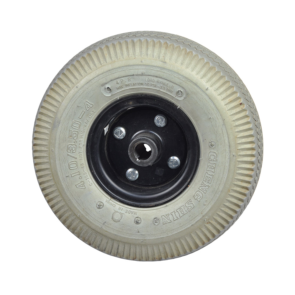 Drive Wheel Assembly for the Hoveround® Teknique FWD® (Used) featuring a Cheng Shin pneumatic tire and Pr1mo split rim with visible tread wear and slight discoloration.