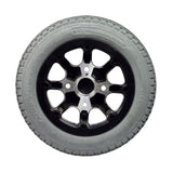 Drive Wheel Assembly for the Quickie Pulse 6 (Used), featuring a black tire with minimal tread wear and a silver rim with minor scratches, showcasing the Primo brand 2.50-8 tire and C177G Power Plant Knobby tread.