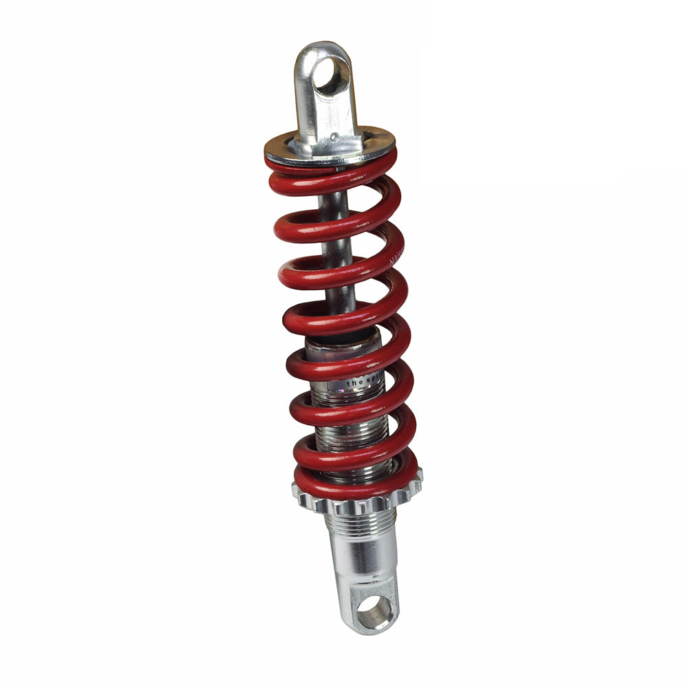 Shock Absorber for the Quickie Pulse 6 (Used) featuring a visible red coil spring and silver components, suitable for both left and right sides.