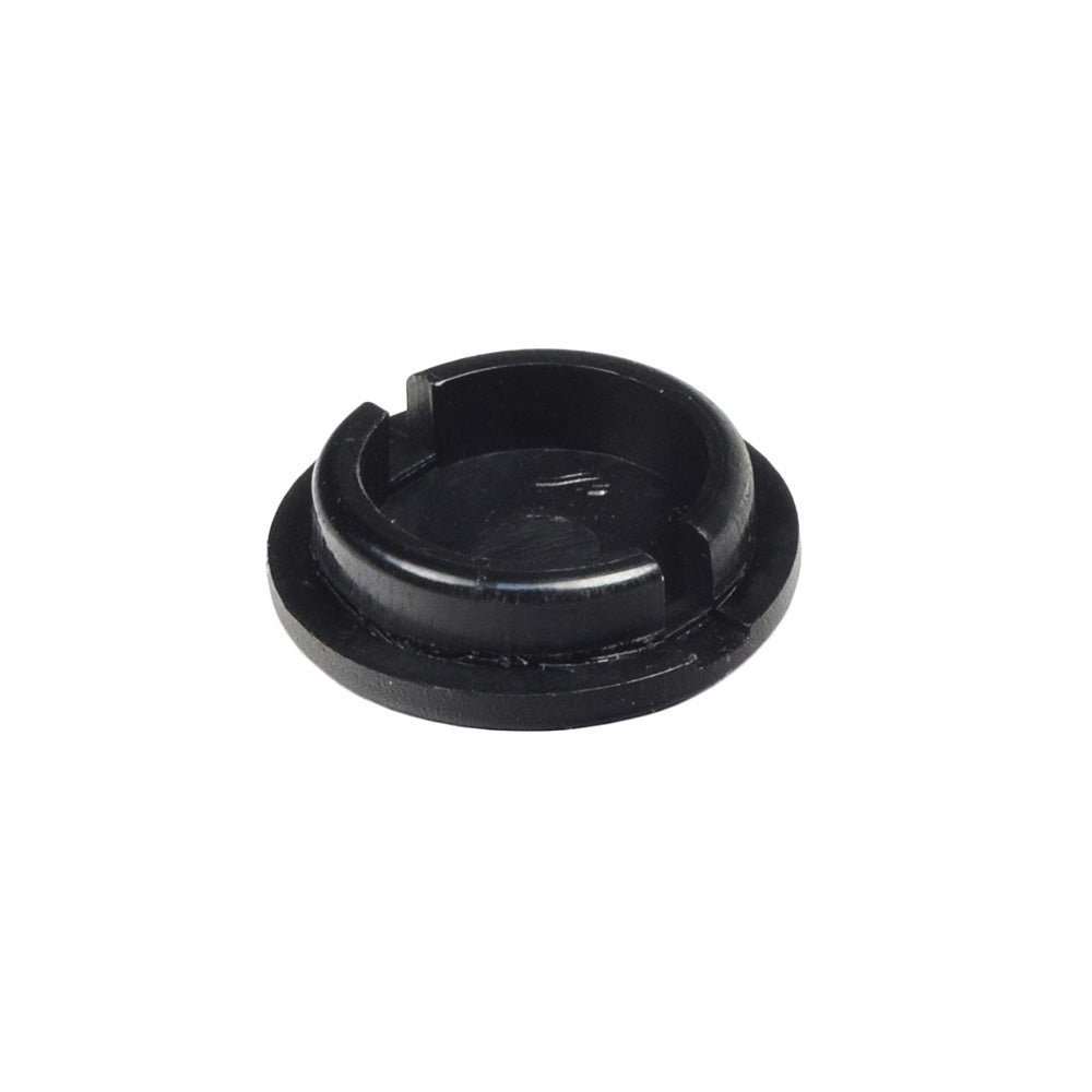 Caster Cap for the Quickie Pulse 6 (Used): A black round object with a central hole designed to seal dirt and moisture out of caster wheel bearings, extending the life of the power chair's moving parts.