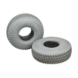 Set of Two 3.00-4 (10x3, 260X85) Foam-Filled Mobility Tires with Powertrax C248 Tread (Used), featuring a grey, non-marking rubber design with visible holes and a 3.15 bead width.