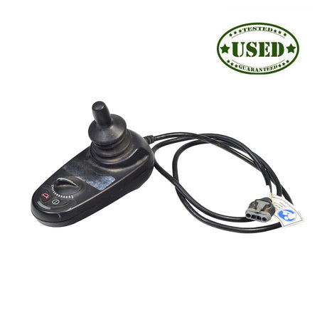 2-Key GC Joystick with 4 Prong Connector for Jazzy Power Chairs (Used) – A black remote control featuring a wire, knob, and buttons for on/off, speed adjustment, and horn.