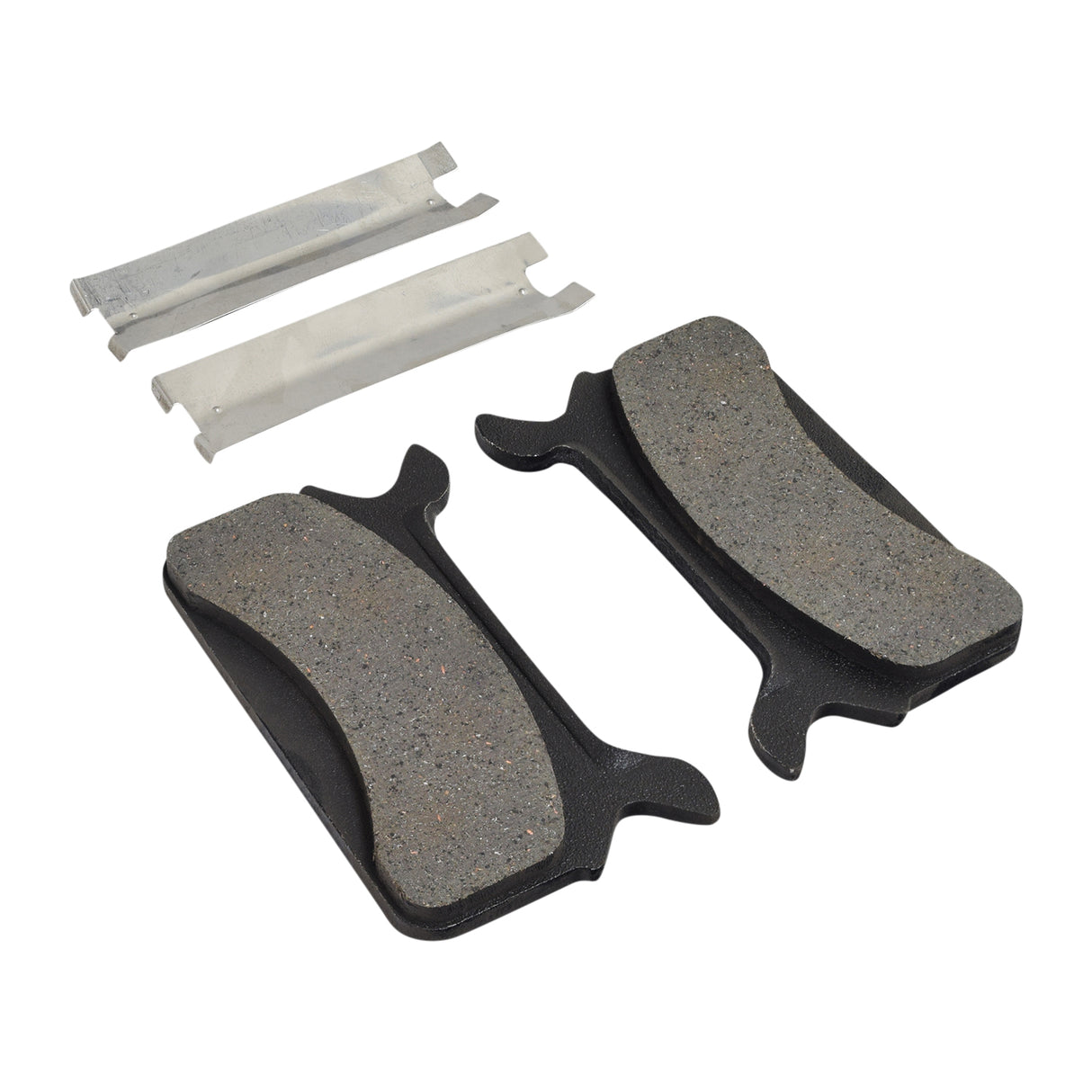 Organic Brake Pads for Polaris Snowmobiles (1993-1998) shown up close, highlighting their detailed, sturdy design suitable for various small gas-powered vehicles. Includes a few pieces of paper nearby.