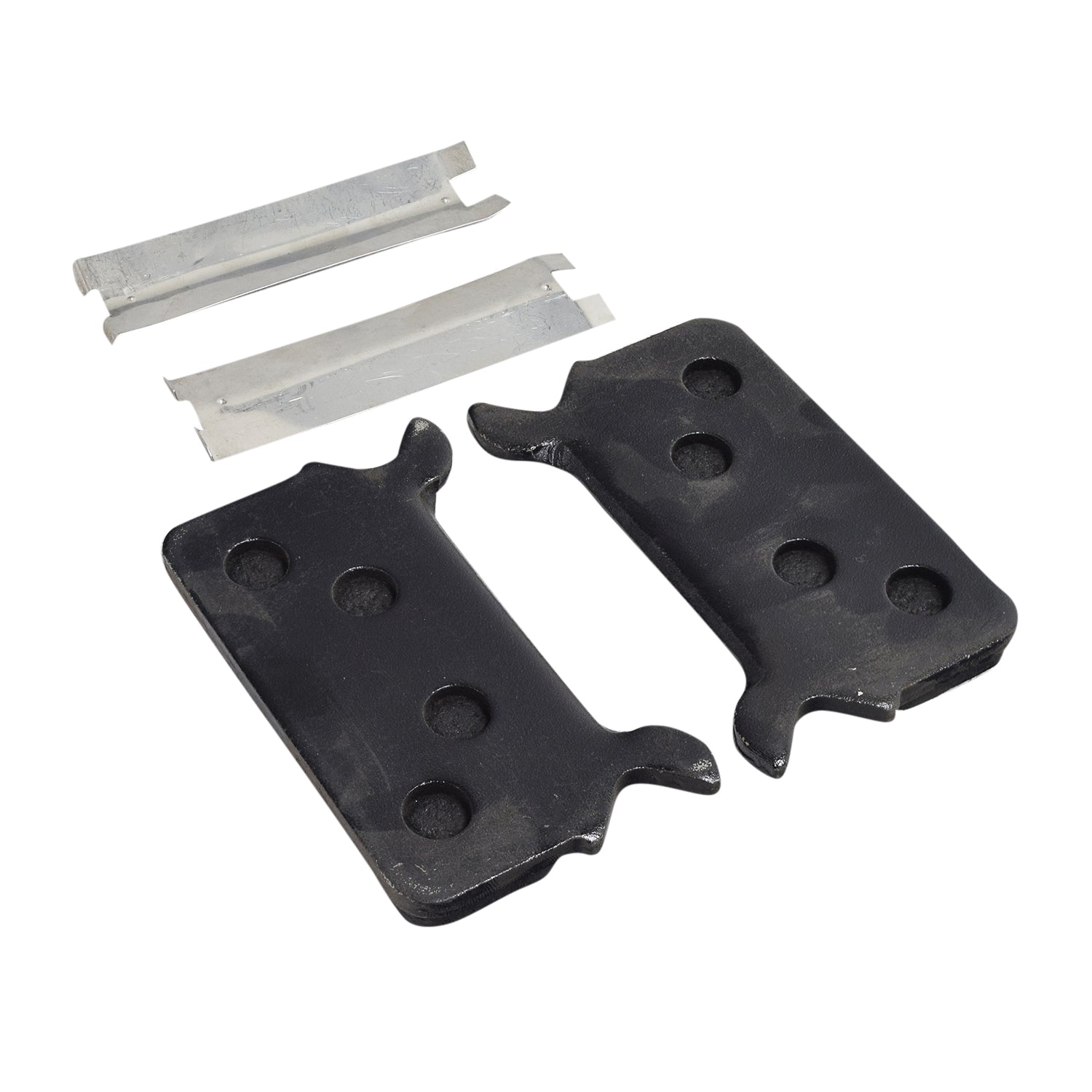 Organic Brake Pads for Polaris Snowmobiles (1993-1998), featuring black metal pieces with holes for dependable performance in extreme conditions, visible in a close-up view. Ideal for ATV, scooter, or motorcycle.