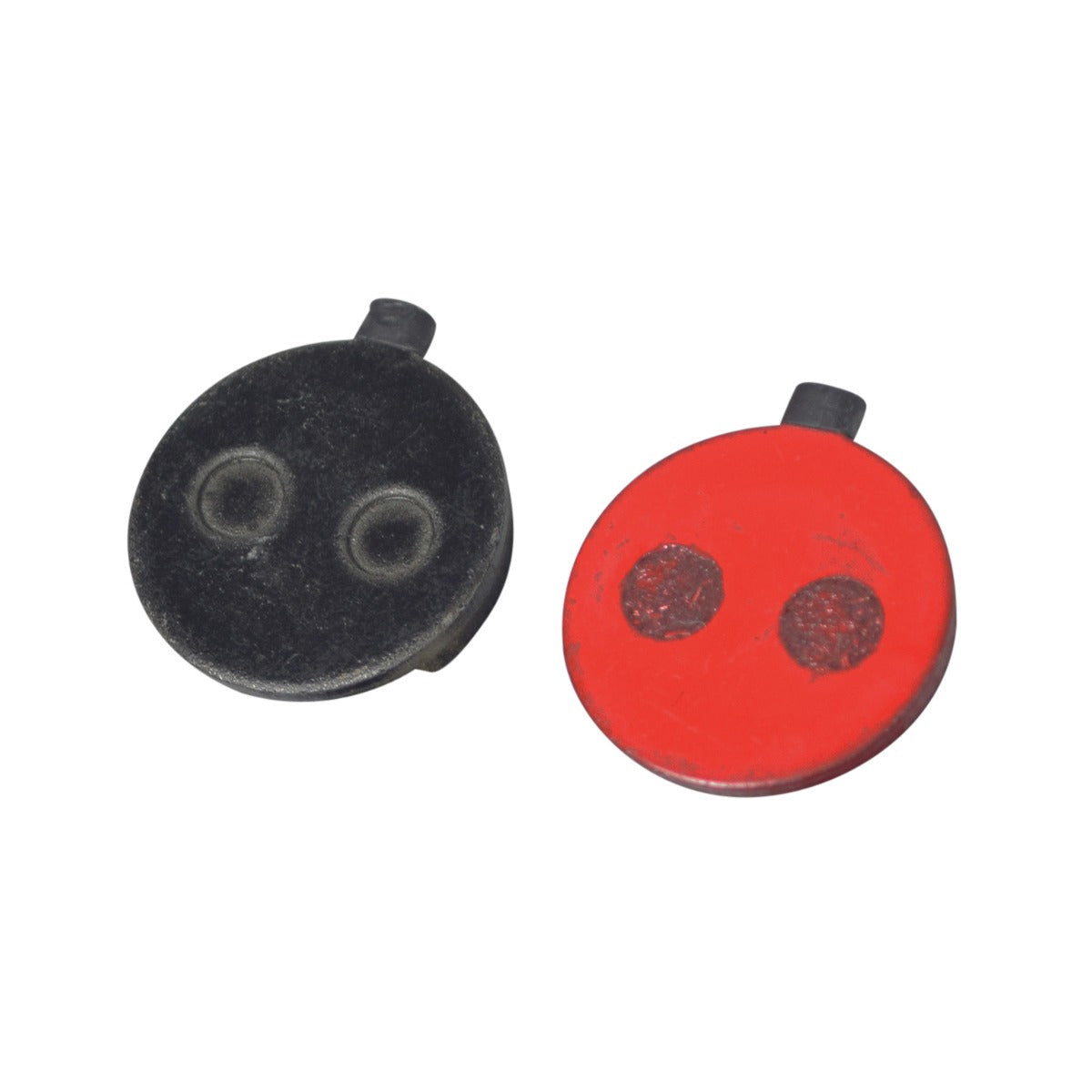 Brake Pads for the Lyft Electric Scooter (Set of 2) featuring round shapes with visible circular patterns, designed with small copper flecks for increased durability.