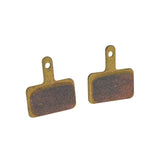 Brake Pads for the GOTRAX EBE1 Folding Super Sport Bike 16 (Set of 2). Close-up of the two metal brake pads with a textured, rusted surface.