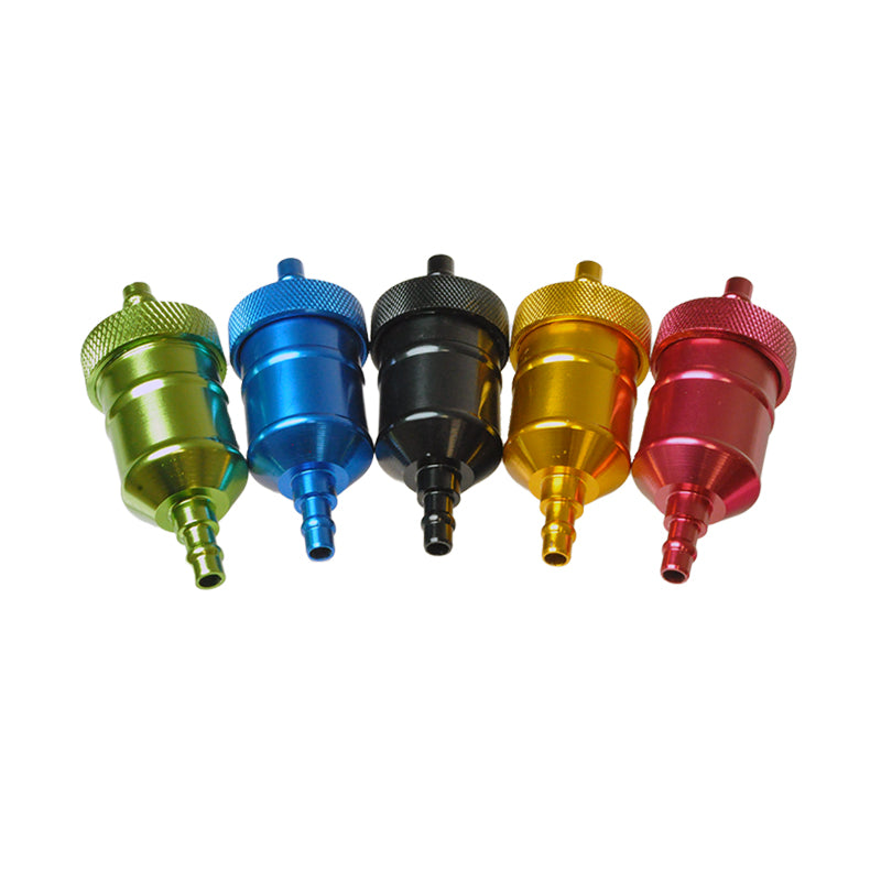 Aluminum Universal Inline Fuel Filter displayed among colorful metal objects, showcasing its sleek anodized finish suitable for various motor vehicles such as scooters, ATVs, and motorcycles.