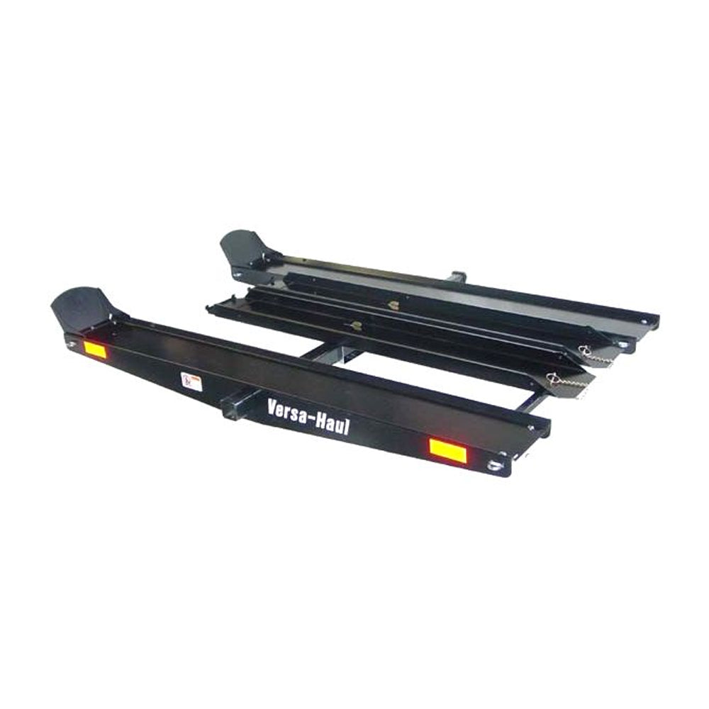 ATV and Go-Kart Carrier with Ramps, featuring a robust black metal design, red light, and wide-tire ramps, ideal for transporting off-road vehicles with ease.